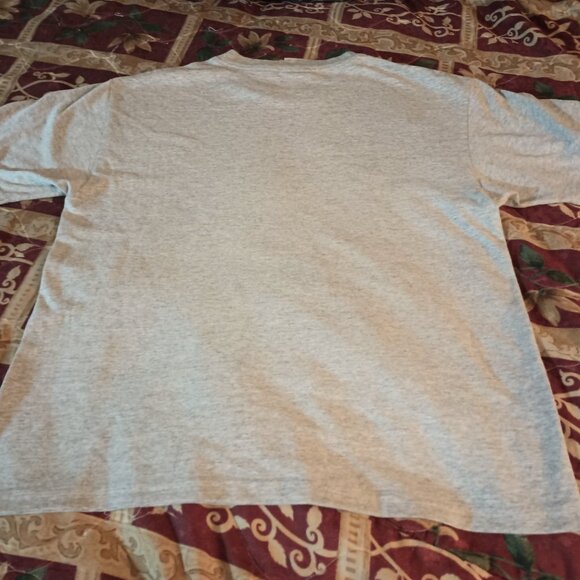 1. It is a Grunge Rock Band Trust Company t-shirt. The size is a Men's Medium. - Picture 3 of 3